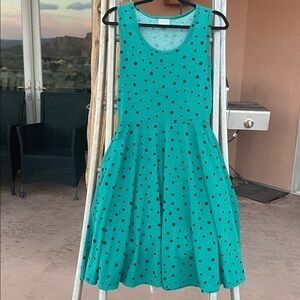 LuLaRoe Green sleeveless dress.